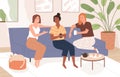 Female friends sitting on comfy sofa, talking and drinking tea. Happy smiling women chatting and relaxing on couch
