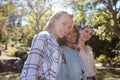 Female friends standing together with arm around Royalty Free Stock Photo