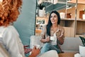 Female friends talking break between work for coffee Royalty Free Stock Photo