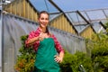 Female gardener in market garden or nursery