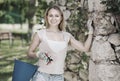 Female gardener with working tools outdoors Royalty Free Stock Photo