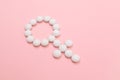 Female Gender Symbol Made from White Pills