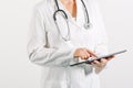 Female general medical practitioner using tablet computer Royalty Free Stock Photo