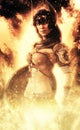 Female Goddess of war posing in fire .