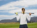 Female Golfer With Club On Golf Course Royalty Free Stock Photo