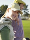 Female Golfer With Friends On Golf Course Royalty Free Stock Photo