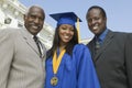 Female Graduate With Father And Brother