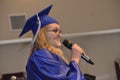 Female graduate gives a speech at her graduation