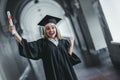 Female graduate in university Royalty Free Stock Photo