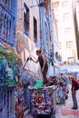 Female graffiti artist painting in Hosier Lane, Melbourne