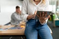 Female graphic designer using digital tablet at desk in office Royalty Free Stock Photo