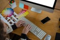 Female graphic designer working at desk Royalty Free Stock Photo