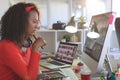 Female graphic designer working on desktop pc at desk Royalty Free Stock Photo