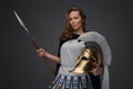 Female greek warrior with spear and golden plumed helmet