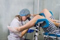 Female Gynecologist During Examination In Her Office