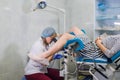 Female Gynecologist During Examination In Her Office