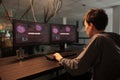 Female hacker cracking password and breaking server encryption