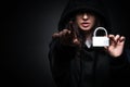 Female hacker hacking security firewall late in office