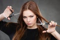 Female hairstylist barber with scissors. Royalty Free Stock Photo