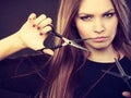 Female hairstylist barber with scissors. Royalty Free Stock Photo