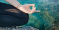 Female hand in aakaash mudra yogic gesture