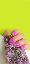 Female hand beautiful manicure flower lilac cosmetic