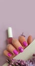 Female hand beautiful manicure flower lilac cosmetic minimalism