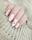 Female hand beautiful manicure sweater Royalty Free Stock Photo