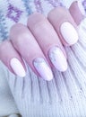 female hand beautiful manicure sweater design Royalty Free Stock Photo