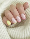 Female hand beautiful manicure sweater design, elegant Royalty Free Stock Photo