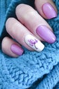 Female hand beautiful manicure sweater knitted fashion Royalty Free Stock Photo