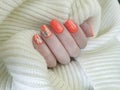 Female hand beautiful manicure sweater Royalty Free Stock Photo