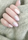 Female hand beautiful stylish manicure clothing elegant winter sweater creative