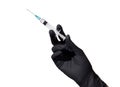 Female hand in black glove holding a syringe with transparent liquid, isolated on a white background Royalty Free Stock Photo