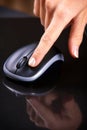 Female hand clicking mouse