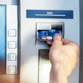 Female hand - close up - cash withdrawals at ATMs