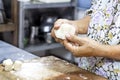 Female hand cooking homemade dessert chinese pastry or mooncake