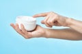 female hand cream jar cosmetics spa treatments dermatology Royalty Free Stock Photo