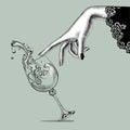 Female hand and a falling glass with splashed wine Royalty Free Stock Photo