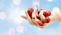 Female hand full of red cherries Royalty Free Stock Photo