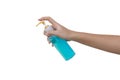 Female hand gesturing press on pump clear bottle to drop blue alcohol gel on hand for hand washing to protect bacteria. Royalty Free Stock Photo