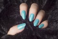 Glittered light blue nails manicure