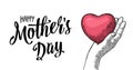 Female hand hold human heart. Happy Mother`s Day lettering