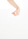 Female hand hold invisible items isolated on white background. Copy space Royalty Free Stock Photo