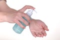 Female hand holding bottle with liquid soap Royalty Free Stock Photo