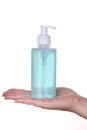 Female hand holding bottle with liquid soap Royalty Free Stock Photo