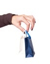 Female hand holding bright shopping bags Royalty Free Stock Photo