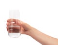 Female hand holding clean drinking glass with water Royalty Free Stock Photo