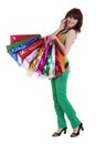 Female hand holding colorful shopping bags Royalty Free Stock Photo