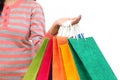 Female hand holding colorful shopping bags Royalty Free Stock Photo